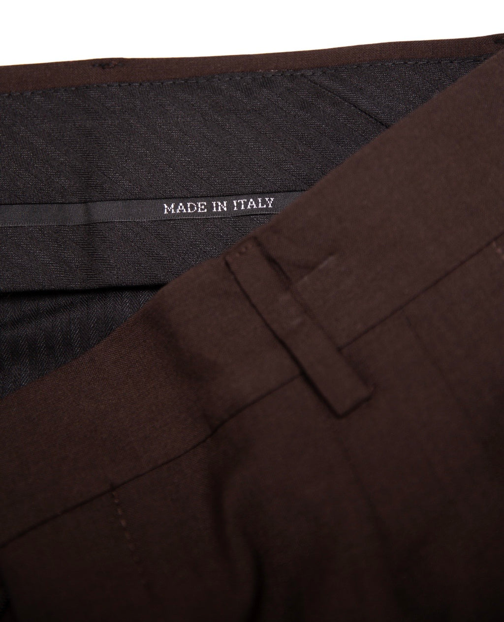 Brown fabric with 'Made in Italy' label on a white background