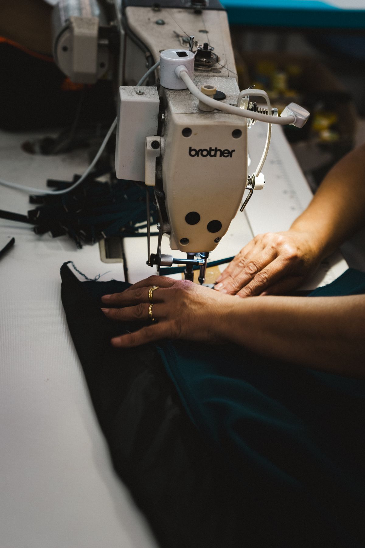 A seamstress sewing a trouser