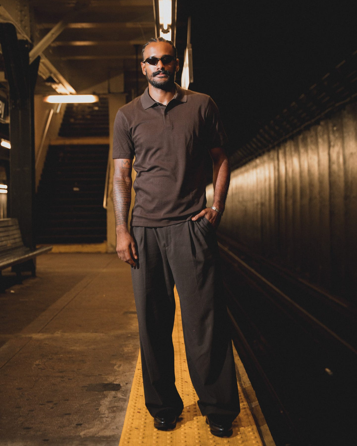 On the subway in New York in Once in a Blue trousers